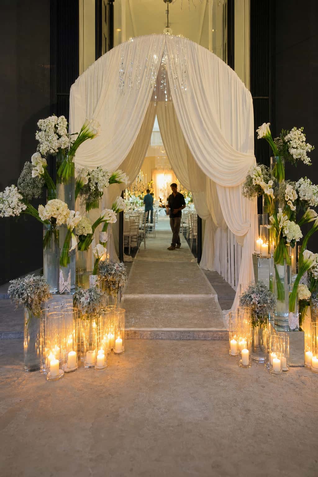 Wedding and social event styling by RKPRODXN — floral arch ceremony