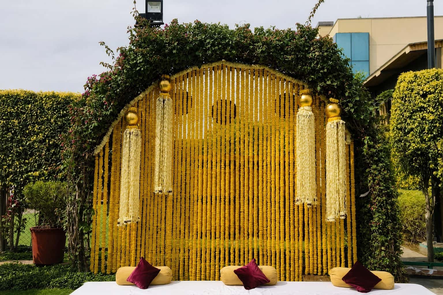 Wedding and social event styling by RKPRODXN — evening mandap glow · 4
